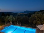 Pool at night with views